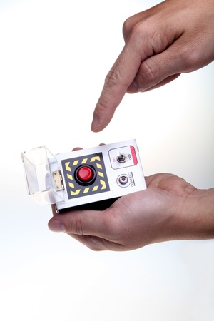Hand-held detonator for bomb 