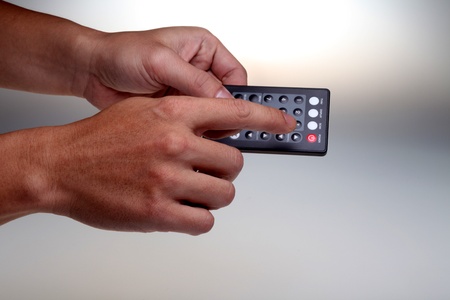 Hand-held remote control electronic equipmentの写真素材