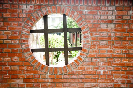 red damaged weathered brick wallの写真素材