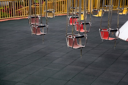 empty chairs of Ferris wheel