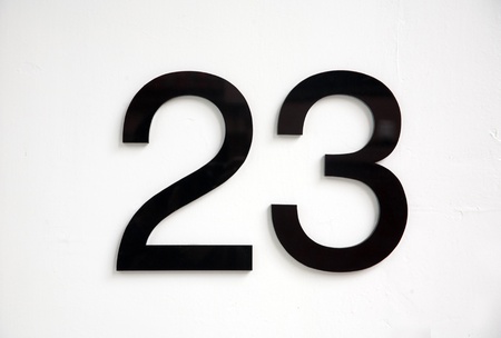 black number 23 on doorの写真素材