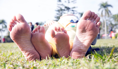 foot of kid and mother foot of kidの写真素材