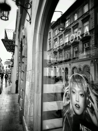 Cracow, architecture, reflections in shop windows. Krakow, Poland.