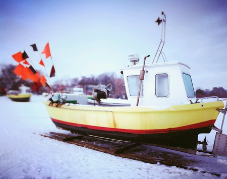 Fish boat on the beach in winter scenery.の素材