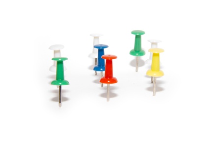 red, blue, green and white pushpins