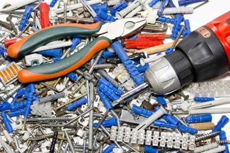 screwdriver, pleiers, screw, dowels and electric connectors