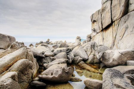 vibrant colors of rocky shoreの写真素材