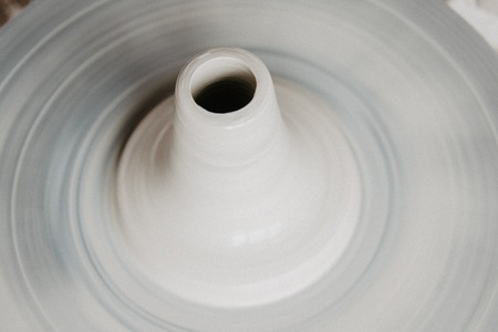 Top view of clay products, on a pottery wheel with copy spaceの写真素材