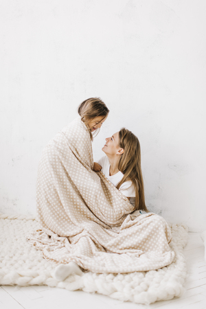 young beautiful mother with her daughterの写真素材