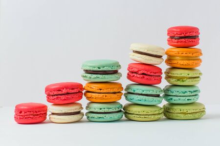 Beautiful colorful desserts. French macaroons on a white backgroundの写真素材