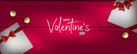 Valentines Day wood 3d vector background. Wooden texture, gift box with red satin ribbon bow and chocolate candy. Top view realistic design.のイラスト素材