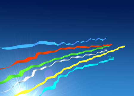 Multi-coloured tapes against the blue sky and solar beamsの写真素材