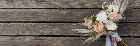 Banner wedding bouquet of pastel shades of pink and white flowers.の写真素材