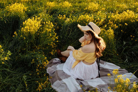 Mom and daughter in a field of flowersの写真素材