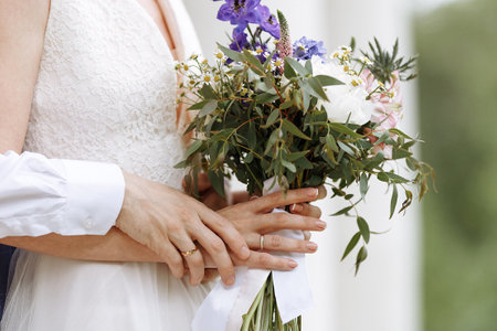 Wedding bouquet in handsの写真素材