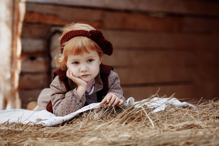 Girl in the hayloftの写真素材