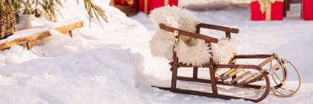 Authentic wooden old sled on Christmas backgroundの写真素材