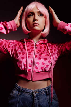 Doll woman, surreal portrait of a model with pink hairの写真素材