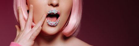Banner glamor portrait of a surprised woman with pink hair and gloss on her lips