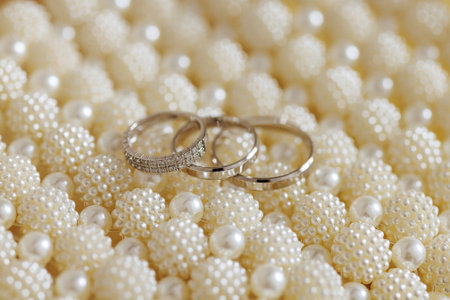 Three rings, pearls, church engagement symbol.の写真素材