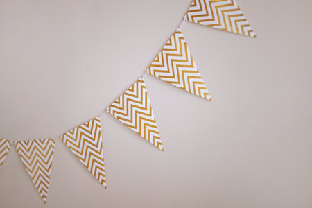 Chevron patterned bunting on white wall