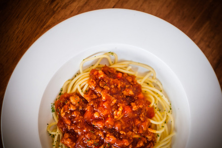 Spaghetti close up on white plate の写真素材