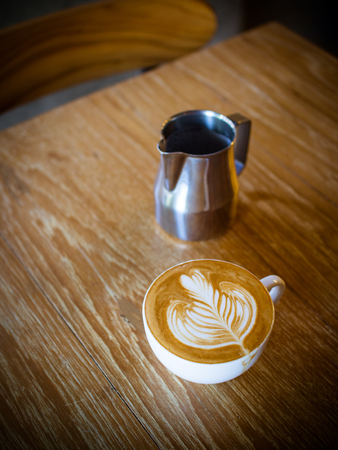 Cup of coffee latte in coffee shopの写真素材