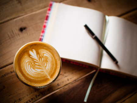 Cup of coffee latte in coffee shopの写真素材