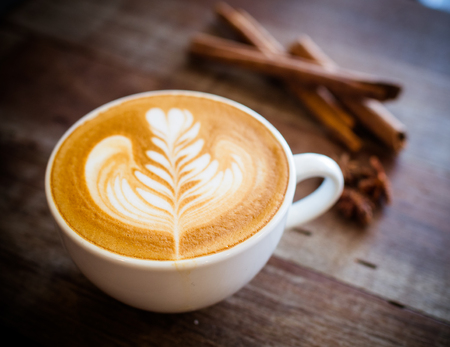 Cup of coffee latte in coffee shopの写真素材