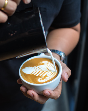 cup of coffee latte in coffee shopの写真素材
