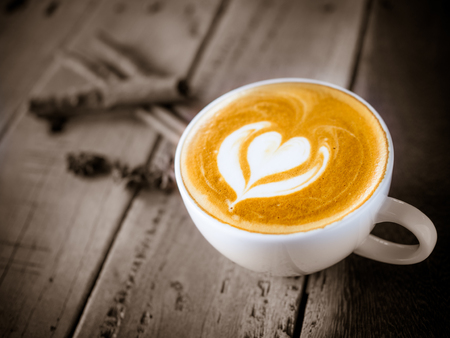 Cup of coffee latte in coffee shopの写真素材