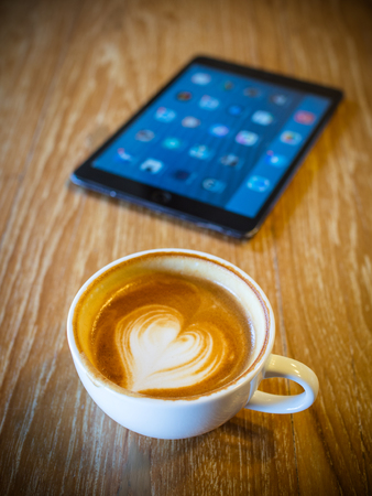 cup of coffee latte in coffee shopの写真素材