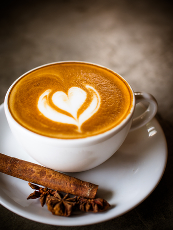 Cup of coffee latte in coffee shopの写真素材