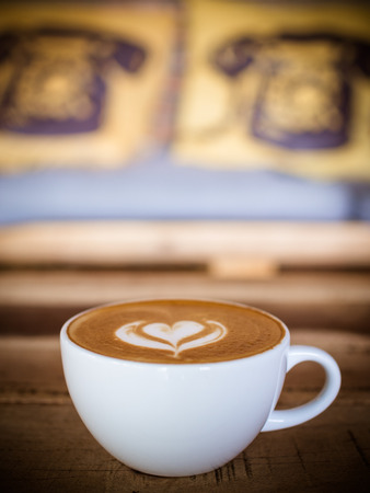 Cup of coffee latte in coffee shopの写真素材