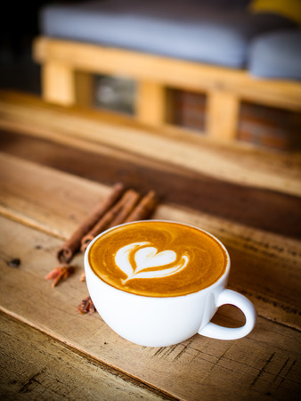 Cup of coffee latte in coffee shopの写真素材