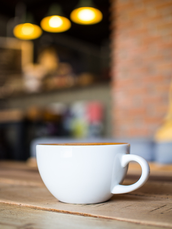Cup of coffee latte in coffee shopの写真素材