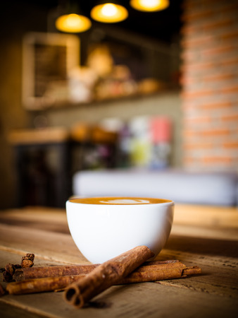 Cup of coffee latte in coffee shopの写真素材