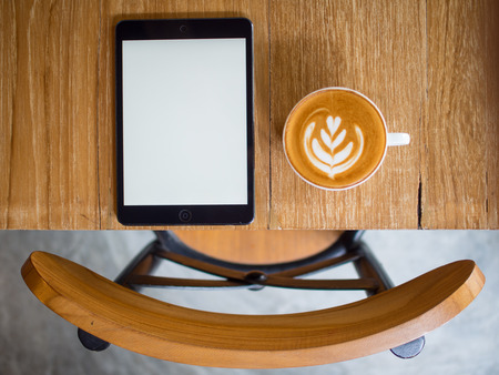 smartphone and coffee on wood blank spaceの写真素材