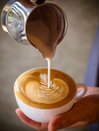 cup of coffee latte in coffee shopの写真素材