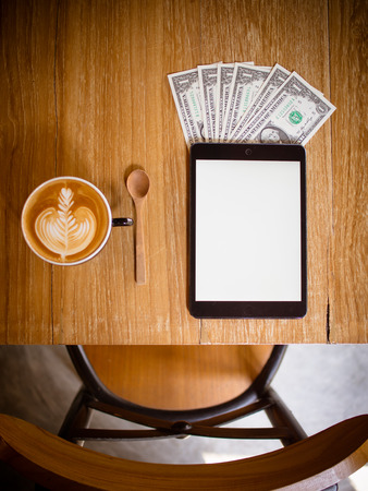 coffee and money smartphoneの写真素材