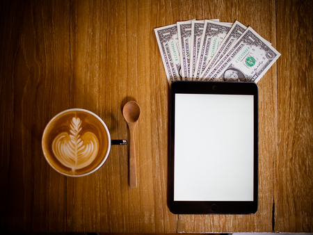 coffee and money smartphoneの写真素材