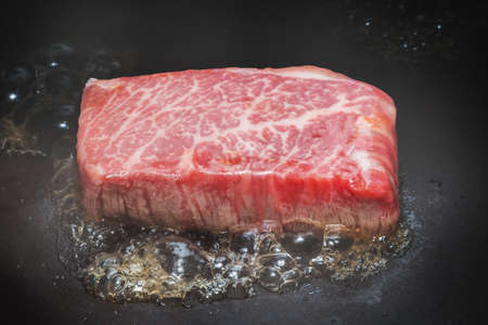 Wagyu steak with a sizzle feeling High-quality Japanese beef steakの写真素材