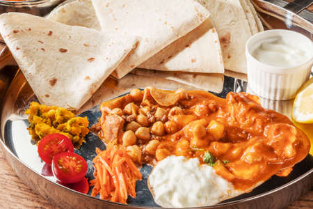 Typical Indian Curry and Nan Typical Indian Curry Setの写真素材