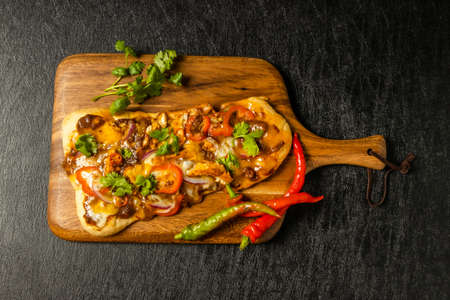 Calinan Curry pizza made from Indian bread (nan)の写真素材