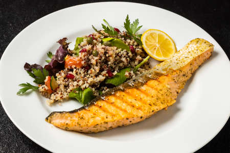 Grilled Salmon with Quinoa Steak of the Iron Panの写真素材