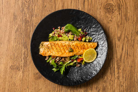 Grilled Salmon with Quinoa Steak of the Iron Panの写真素材