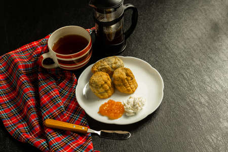British scones Scottish scones with tea, jam and creamの写真素材