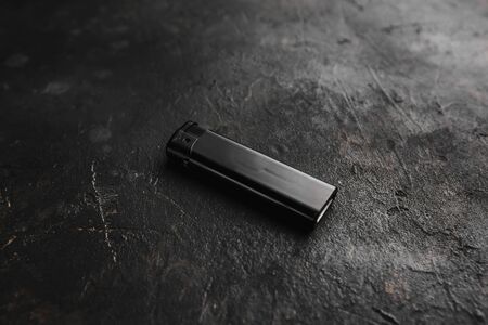 gas lighter on a black background