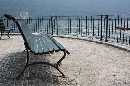 Empty bench in Como, Italyの写真素材