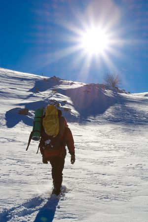 Hiker are in winter in mountainsの写真素材